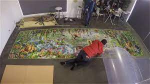 At 33,600 pieces, it breaks the previous record of 32,000 pieces, held since 2010 by ravensburger's double retrospect by keith. This Time Lapse Video Of A Man Assembling A 33 600 Piece Puzzle Is Absolutely Incredible Hellogiggles