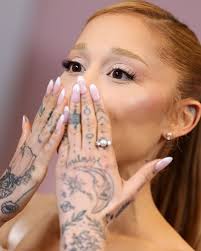 Ariana Grande & Zoe Saldana at The 82nd Annual Golden Globes first-time  nominee celebration. Ariana's hand tattoos are so Iconic! 🤩🤩 📸:  shutterstock #arianagrande #zoesaldana #explore #explorepage #trend  #trending #fyp
