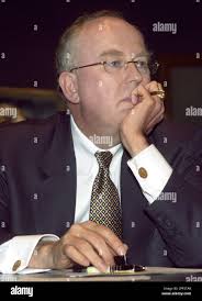 John Rowe, chief executive officer of Exelon, the parent company of ComEd,  listens during a committee hearing concerning ComEd's possible purchase of  Illinois Power, at the Capitol building in Springfield, Ill., Monday,
