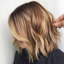 Shoulder Length Wavy Light Brunette Hair With Blonde Highlights Hiding The Face Of A Woma In 2020 Brown Hair With Blonde Highlights Brown Blonde Hair Blonde Highlights
