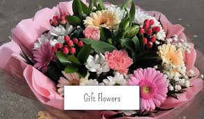 A religious sympathy flower arrangement often features a cross. Gift And Funeral Flowers Delivered Daily In Colchester By Jennifleurs Your Colchester Florist