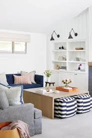 If You Need Occasional Additional Seating Tuck Comfy Poufs Or Ottomans Beneath The Coffee Living Room Without Sofa Summer Living Room Decor Simple Living Room