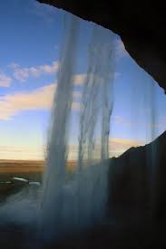 Chilling Literally Behind Seljalandsfoss Falls In Iceland Iceland Travel Iceland Hikes Iceland Treks Iceland Waterfalls Iceland Travel Tips Things To Do