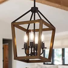 This classic lantern chandelier light features an imitation wood grain caged frame with exposed light bulbs that emites warm lighting from. Linsly Rustic Chandelier 4 Light Farmhouse Chandelier Imitation Wood Light Fixture Small Vintage Lantern Chandelier Iron Cage Pendant Lighting For Kitchen Island Foyer Dining Room Living Room 4 Wc Amazon Com