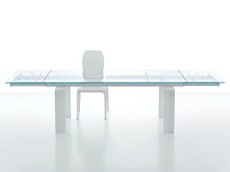 Seats up to 4 people, ideal for any dining area, such as a kitchen, dining room, dinette, or small apartment. Dining Table With Extendable Glass Top Idfdesign