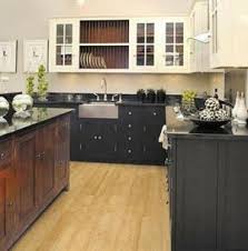 We still managed to get our lower cabinets stained darker as planned. Kitchen Color Scheme Idea White Wood Kitchens Black White Kitchen Kitchen Cabinets And Backsplash
