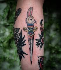 He's a mini lion head rabbit and i guess he can be considered a torte color. 17 Killer Dagger Tattoo Designs Female Tattooers
