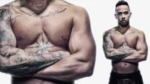 Iggy azalea crosses out asap rocky tattoo vibe. Lewis Hamilton Opens Up About His Tattoos As He Poses For Front Cover Of Men S Health Magazine Daily Mail Online