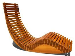 A Wood Rocking Lounger For Poolside Liegestuhl Gartenliege Gartenstuhle