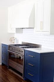 A Two Toned Blue And White Kitchen Remodel Kitchen Cabinets Color Combination Kitchen Remodel Small White Kitchen Remodeling