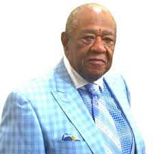 John Rogers holds onto seat