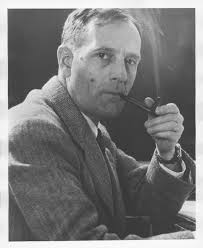 Edwin Powell Hubble, smoking a pipe.