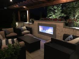 Contemporary Outdoor Room With Fireplace Includes A Pergola Led Lighting And A Natural Stone Pati Outdoor Gas Fireplace Outdoor Pergola Contemporary Outdoor