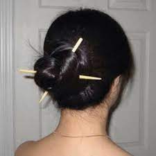 How Cute Would This Be With Pencils I M Mean You Could Totally Be The Nerdy Girl Aesthetic Hair Hair Styles Chopstick Hair