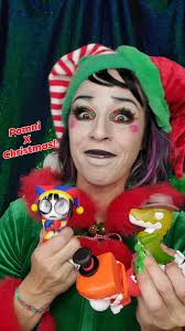 Where are my Digital Circus peeps?? 🎪 I did a Christmas inspired Pomni  look...what do you think? ❤️💚 , #pomni #pomnidigitalcircus #moosetoys  #christmasmakeup #amazingdigitalcircus , Toys: @moosetoys ...