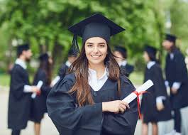 A Young Female Graduate Against the Background of University Graduates.  Stock Photo - Image of outdoors, graduation: 185548502