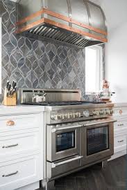 Artistic Tile I We Re Feeling So Inspired By This Newport Beach Kitchen Designed By Anna Marie Claassen White Kitchen Appliances Kitchen Remodel Kitchen Design