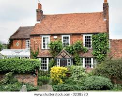English village communities are small and often eccentric. Red Brick Village House In Rural England With A Wall And Cottage Garden To The Front Stock Images Page Everypixel