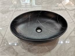 Free shipping on qualified orders. Pate Sanitary Ware Bathroom Furniture Thin Bathroom Sink With Oval Matte Black Marble Wash Basin Countertops From China Tradewheel Com