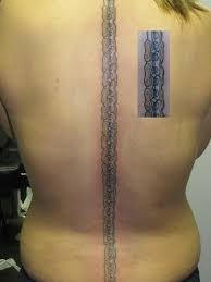 Motorcycle Chain Tattoo Along The Spine 3 Chain Tattoo Tattoos Spine Tattoos