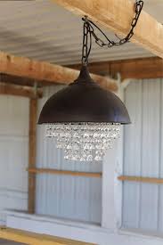 Bent wood staves strapped with a metal loop make this wine barrel chandelier, a retro farmhouse style. Dark Bronze And Glass Crystal Chandelier Pendant Light Metal Chandelier Industrial Light Fixtures Chandelier Pendant Lights