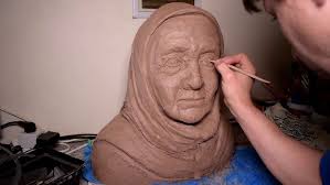 Clay modeling of an old woman portrait