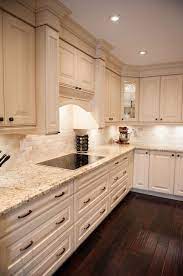 Gold metal already is very attractive as a color. Giallo Ornamental Granite Countertops Include Elegance In The Kitchen Other Is Creative Insp Granite Countertops Kitchen White Kitchen Design Granite Kitchen