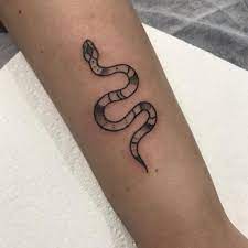 Small snake tattoo on hand. 30 Best Snake Tattoo Designs Of 2021