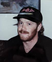 Rocky” Norman Rhodes