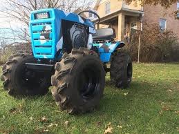 How I Built The Mud Mower Wheel Horse Youtube Lawn Mower Racing Ride On Mower Trailer Homemade Tractor