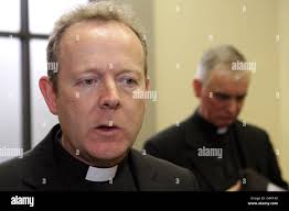 Monsignor Eamon Martin and Fr Michael Canny at St Eugene's Cathedral in  Derry, at the launch of a report into clerical abuse in the Derry Diocese  Stock Photo