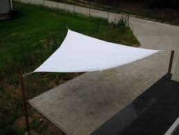 Ein Sonnensegel An Holzpfosten Befestigen So Geht S Sonnensegel Holzpfosten Sonnensegel Garten