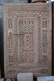 flea market in marrakech bab el khemis flea market insiders moroccan doors vintage doors wood carving patterns
