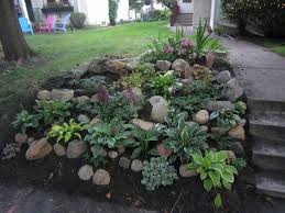 At the most basic level, incorporating a berm in an otherwise flat yard is about raising the viewer's eye level. 5 Steps To Create Landscape Mounds Gardenlovin