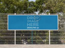 Download Placeit Horizontal Banner Mockup Hanging From A Fence At A School Free Mockup Outdoor Advertising Mockup Banner