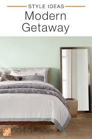 This Modern Getaway Includes An Upholstered Bed Unique Lighting And A Two Tone Nightstand From The Home Depot To Give You Home Dining Room Inspiration Bedroom