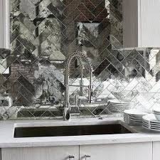 5 beautiful kitchen backsplash ideas—that aren't tile. Mirrored Herringbone Backsplash Tiles Herringbone Backsplash Mirror Backsplash Mirror Tile Backsplash