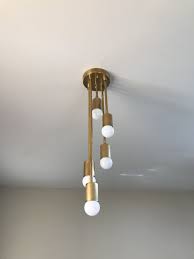Gradibus Gold Raw Brass Modern Semi Flush 5 Bulb Abstract Etsy Modern Flush Mount Lighting Modern Brass Chandelier Modern Lighting Chandeliers