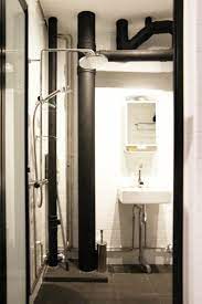 3 Room Hdb Flat In Tampines Singapore Common Toilet Pipes Were Painted Black To Create A Feature Rain Toilet Design Shower Door Designs Bathroom Inspiration