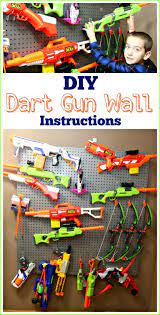 Wall mounted, made from reclaimed barn wood. Nerf Gun Storage