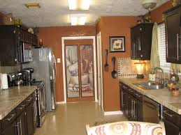 #httb4411 (black/orange) 21 drawer tool cabinet (kit). Love The Burnt Orange Walls Against The Dark Cabinets Home Decor Kitchen Orange Kitchen Walls Bistro Kitchen Decor