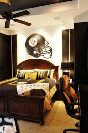 Breathtaking American Football Themed Kids Room Design Amazing American Football Helmet Wallpaper Makes This Kids Teenage Boy Room Bedroom Design Room Design