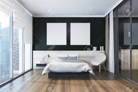 Select from premium hardwood floor images of the highest quality. Black Bedroom Interior With A Wooden Floor A Master Bed With Stock Photo Picture And Royalty Free Image Image 92656514