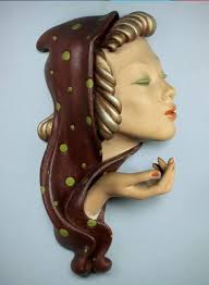 Original 1920/30's Art Deco wall masks.