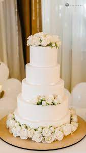 Wedding Reception Cake Table With Floral Decorations And Gold Placemat Rustic Weddin Wedding Cake Table Wedding Cake Table Decorations Diy Wedding Cake Table