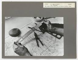 File C 1966 Two Hands Using A Slide Rule At A Drafting