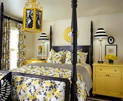 This kitchen features hardwood flooring, yellow walls, and a tall ceiling. Black And Yellow Bedroom Ideas And Photos Houzz