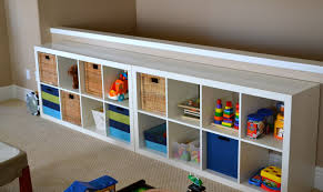 Shelving wall unit made of pipe. Kids Play Room Shelves Novocom Top