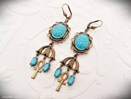 Exotic jewelry inspired by the 1920's art deco egyptian revival style. Pin On Egyptian Revival Jewelry