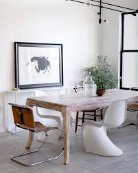 Modern Dining Room With White Panton Chairs And Antique Farm Table Modern Dining Room Panton Chair Dining Room Finishing